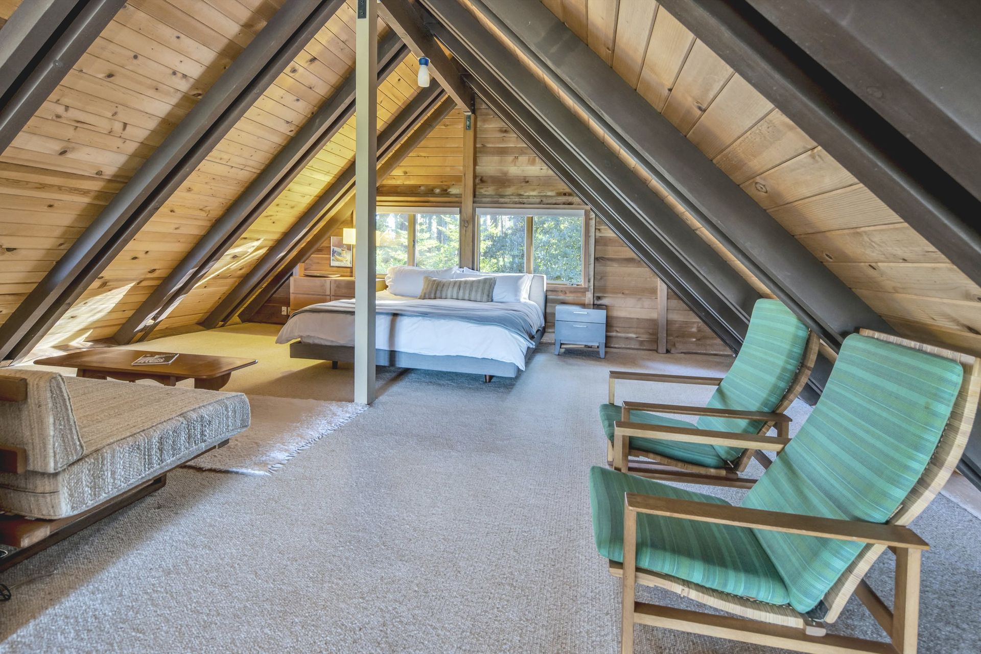 Casa de Lucca loft beneath vaulted A-frame ceiling