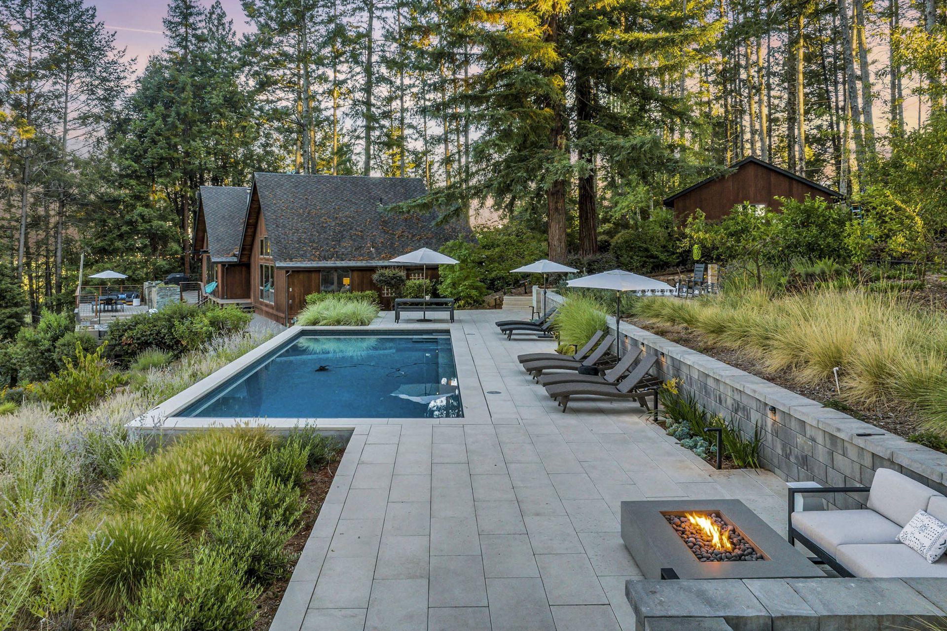 Casa de Lucca pool lit at twilight