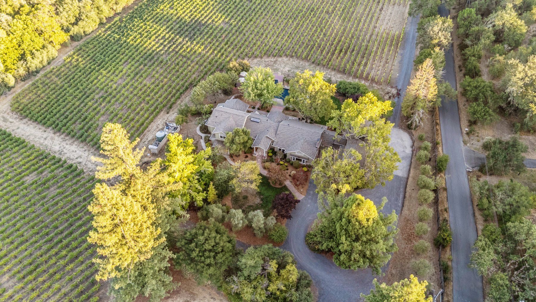 Creekfront aerial alternate angle, 10-acre vineyard estate