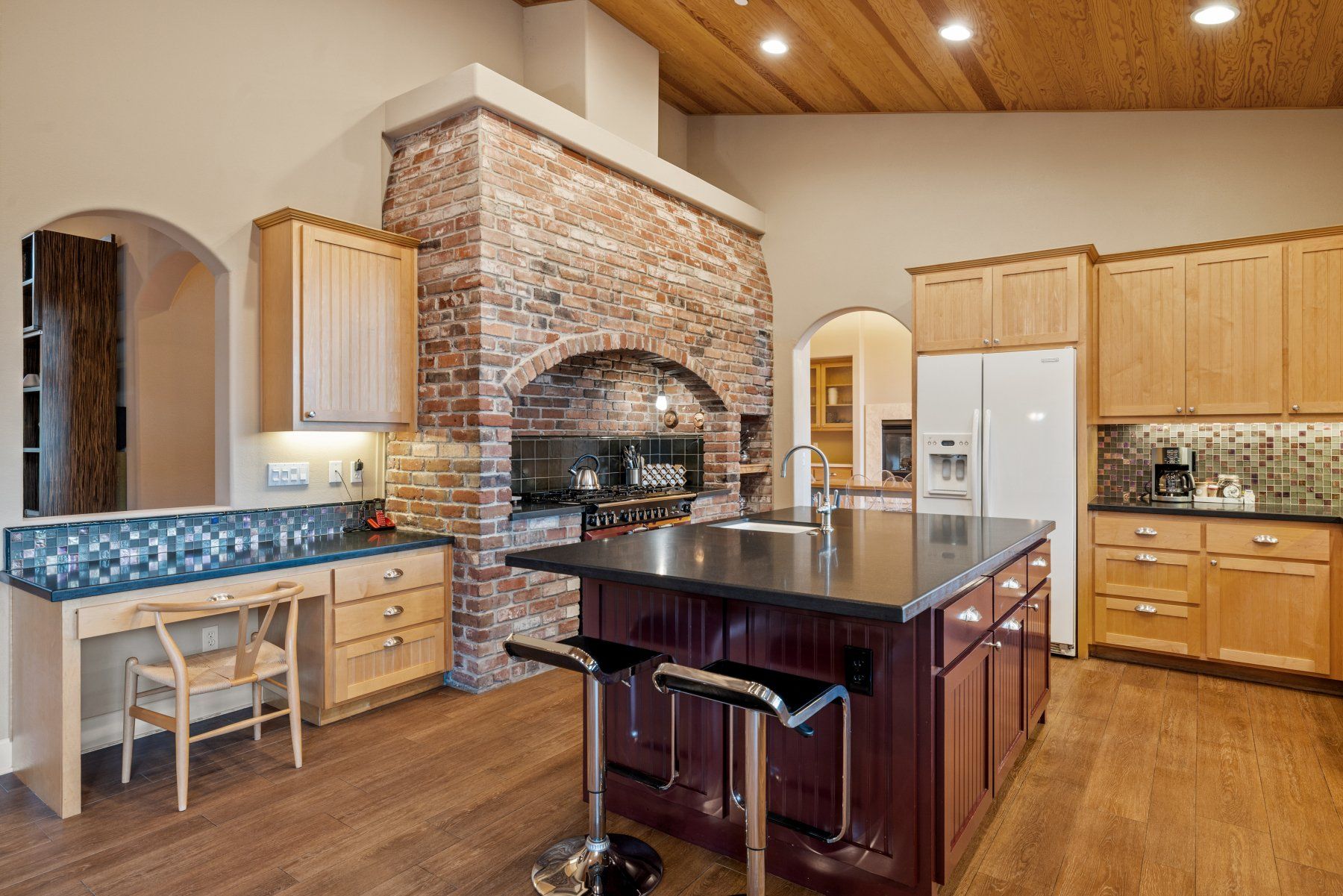 Creekfront gourmet kitchen with island