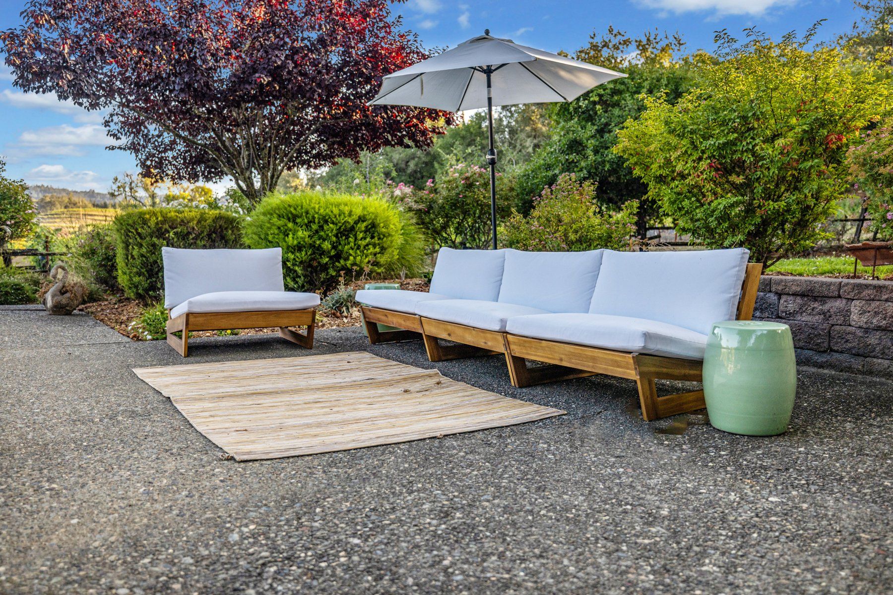 Creekfront outdoor seating in the vineyard